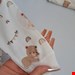 دو تیکه سرهمی و کلاه نوزادی تدی چاپی کد ۱۹۵